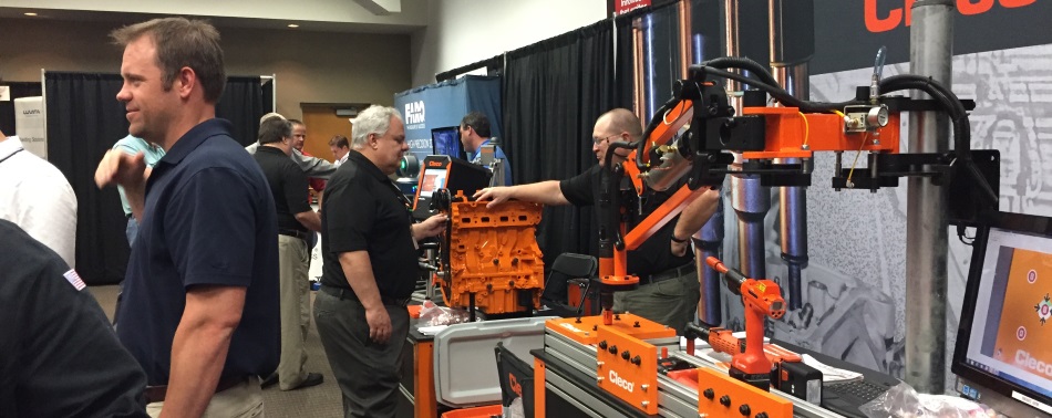 People learning about the various technologies exhibitors brought