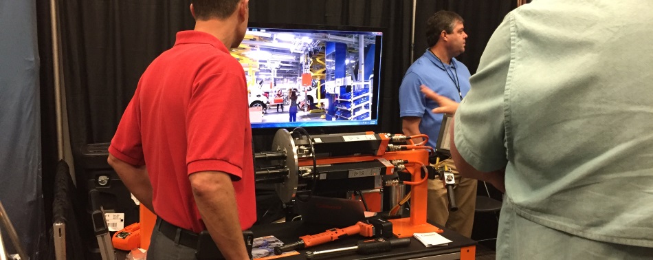 People learning about the various technologies exhibitors brought