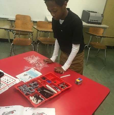 Student working his robot