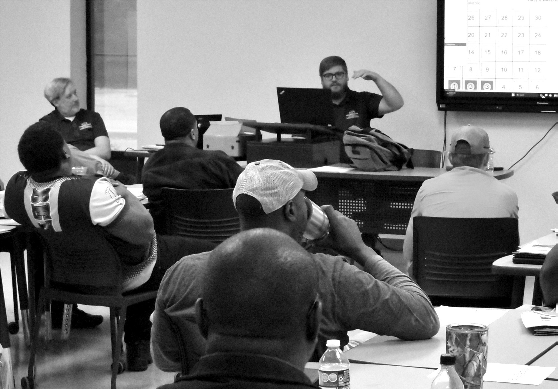CAVS-E engineers, Jonathan Howell and Travis Hill, discuss Industry 4.0 topics - photo by Andy Lewis, Woodville Republican