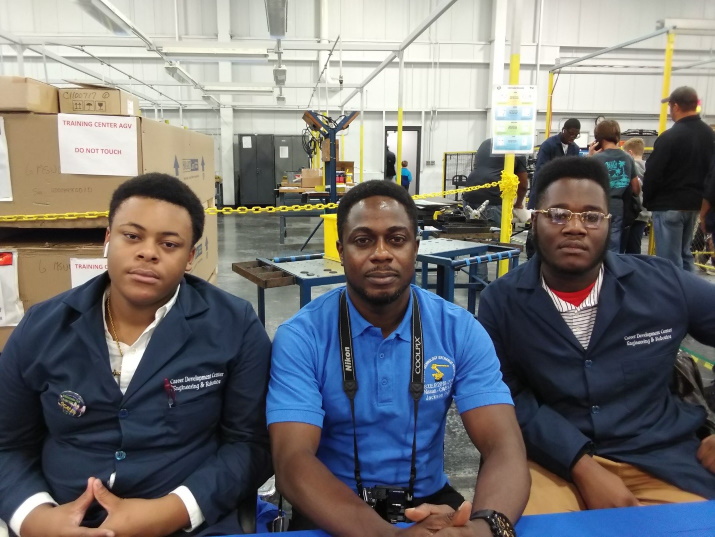 L-R: Dillan Evans 11th Grade (Callaway), Femi Ooloko (Engineering Instructor), Joshua Williams 11th Grade (Wingfield)