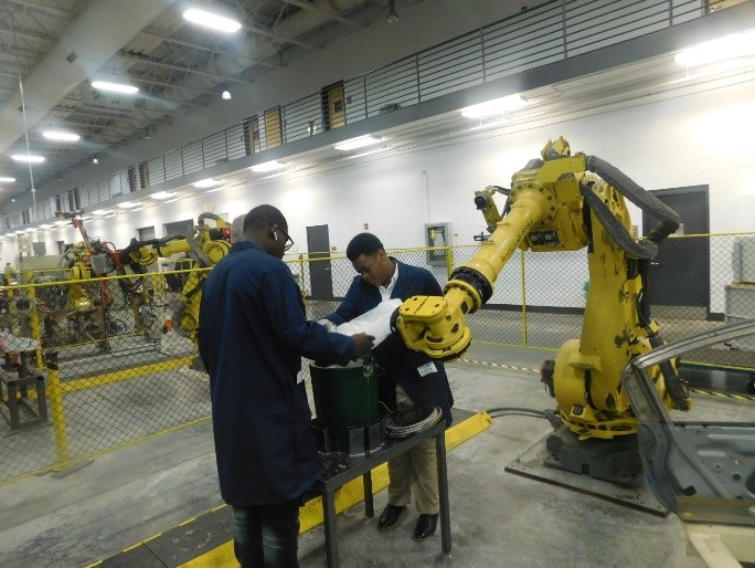 Faunc robot churning ice cream
